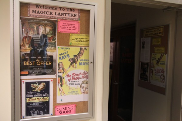 The Magick Lantern preview box shows some of the upcoming classic, art and foreign films that will be shown at the Point Richmond theater. Owner Ross Woodbury said audiences are hit-and-miss at the one-screen theater. (Photo by Kevin N. Hume)